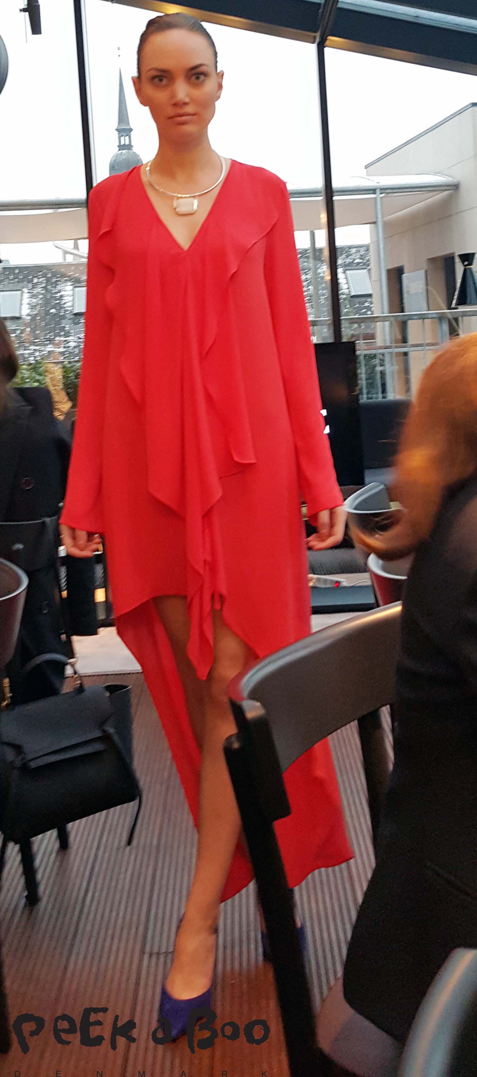 Orange party dress from BCBG Maxazria SS16 collection. They will open a shop in Copenhagen later this month.
