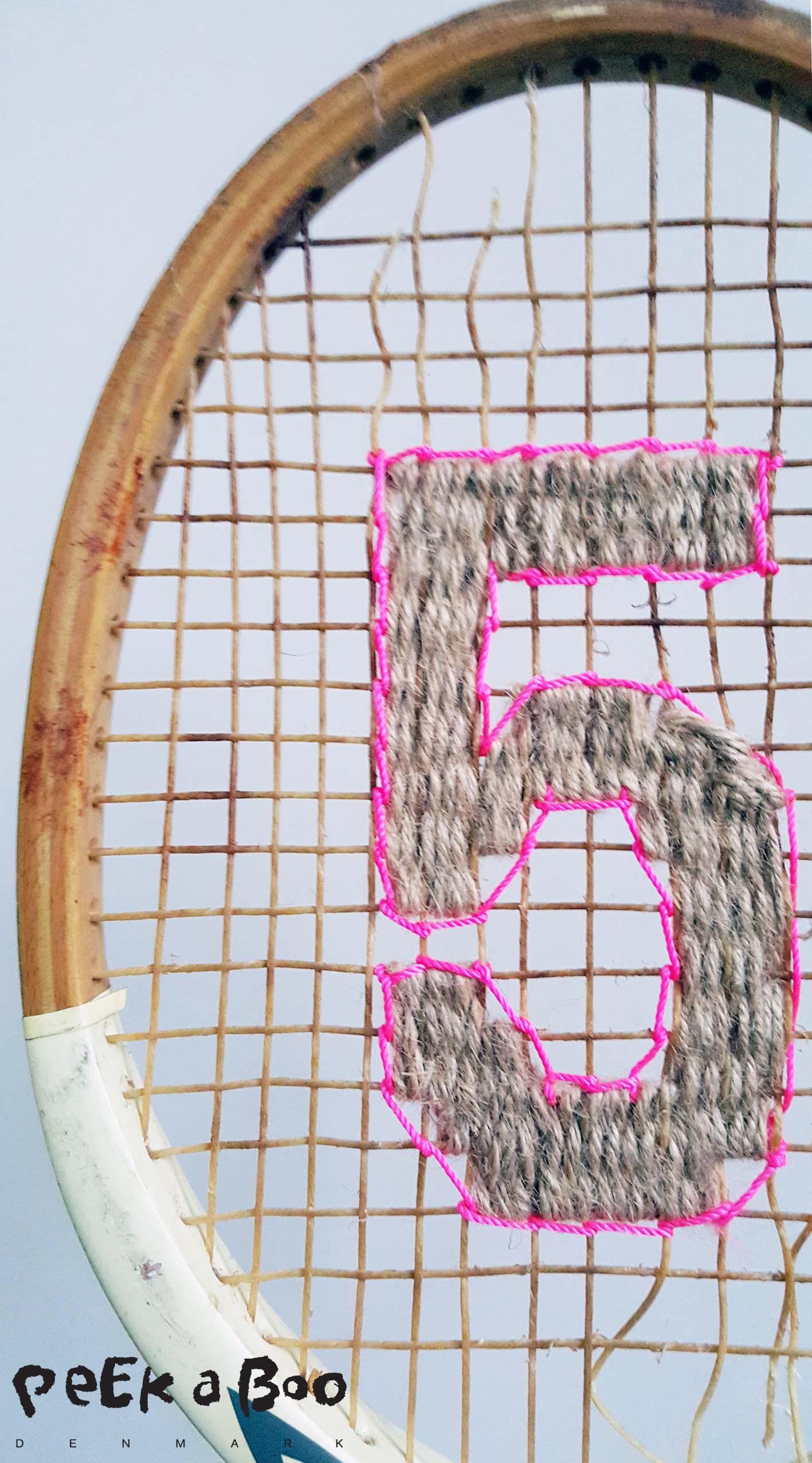 DIY vintage tennis racket for your home decor. Made by Peekaboo design.