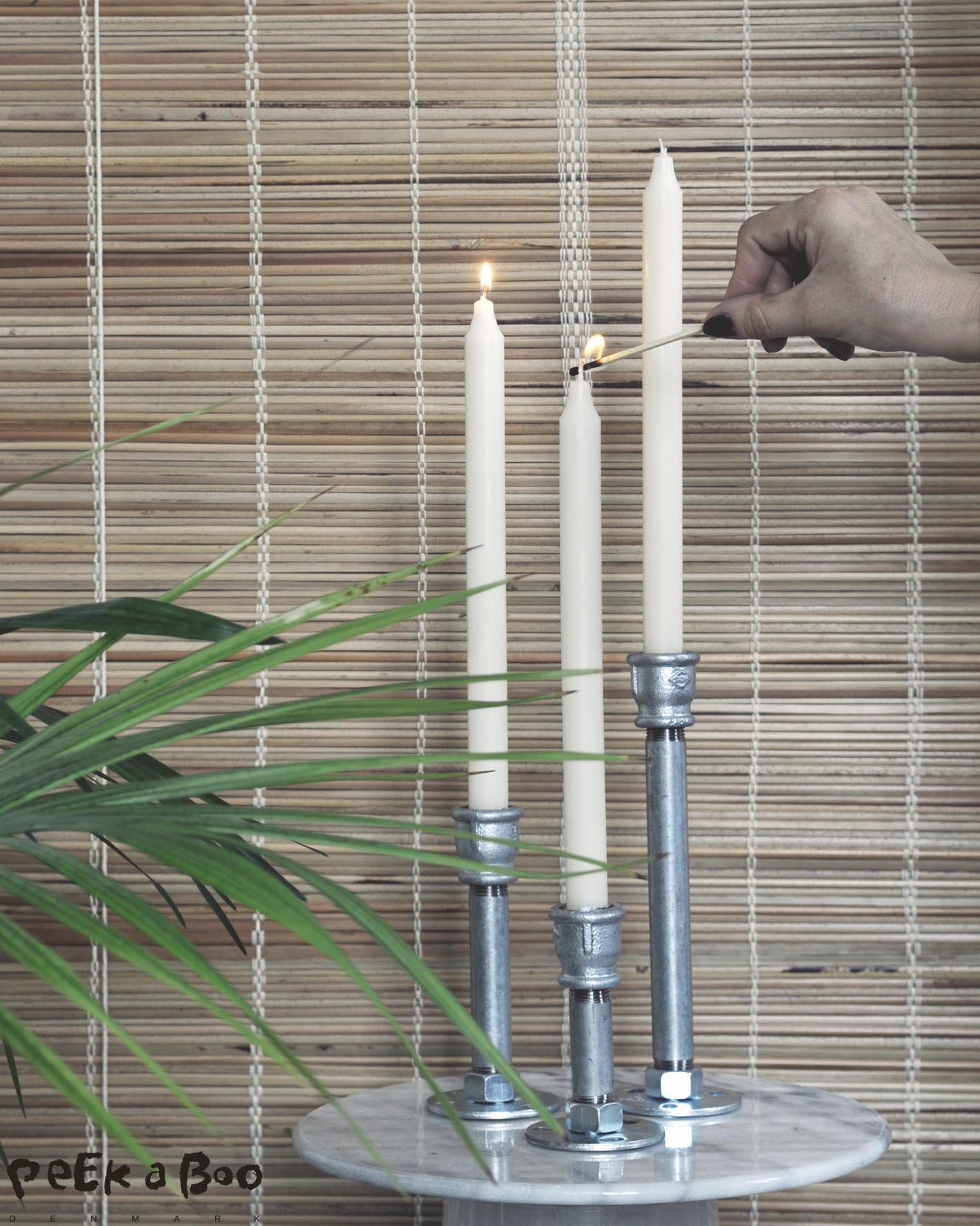 Turn on the light in the dark month with this raw looking DIY candlestick.