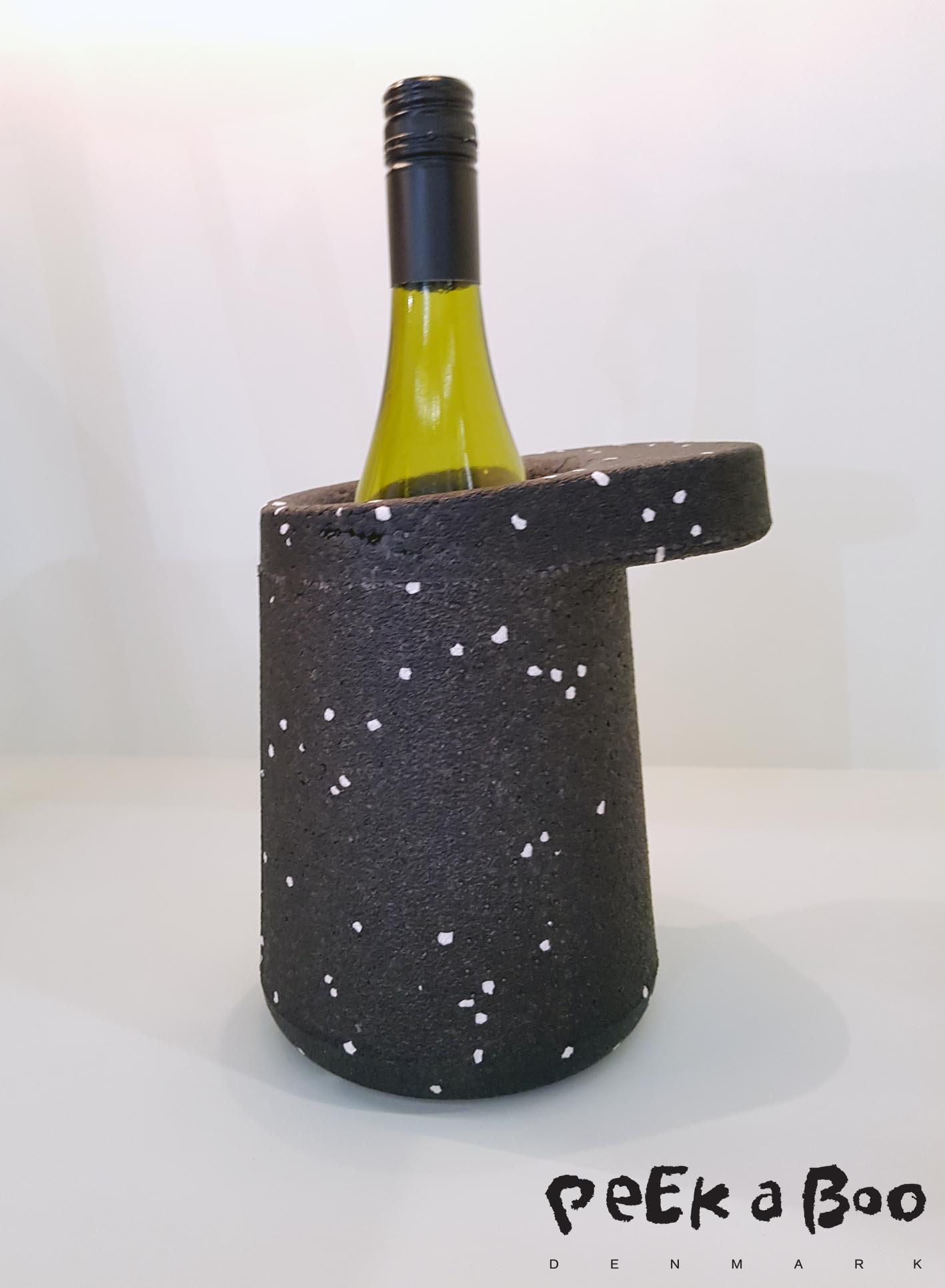 This winecooler is made of EPP. EPP is known for its strong isolating capacity, ready to keep your wine or champagne bottle cool! The cooler is deigned by Ernst Koning and sold through Puik art.