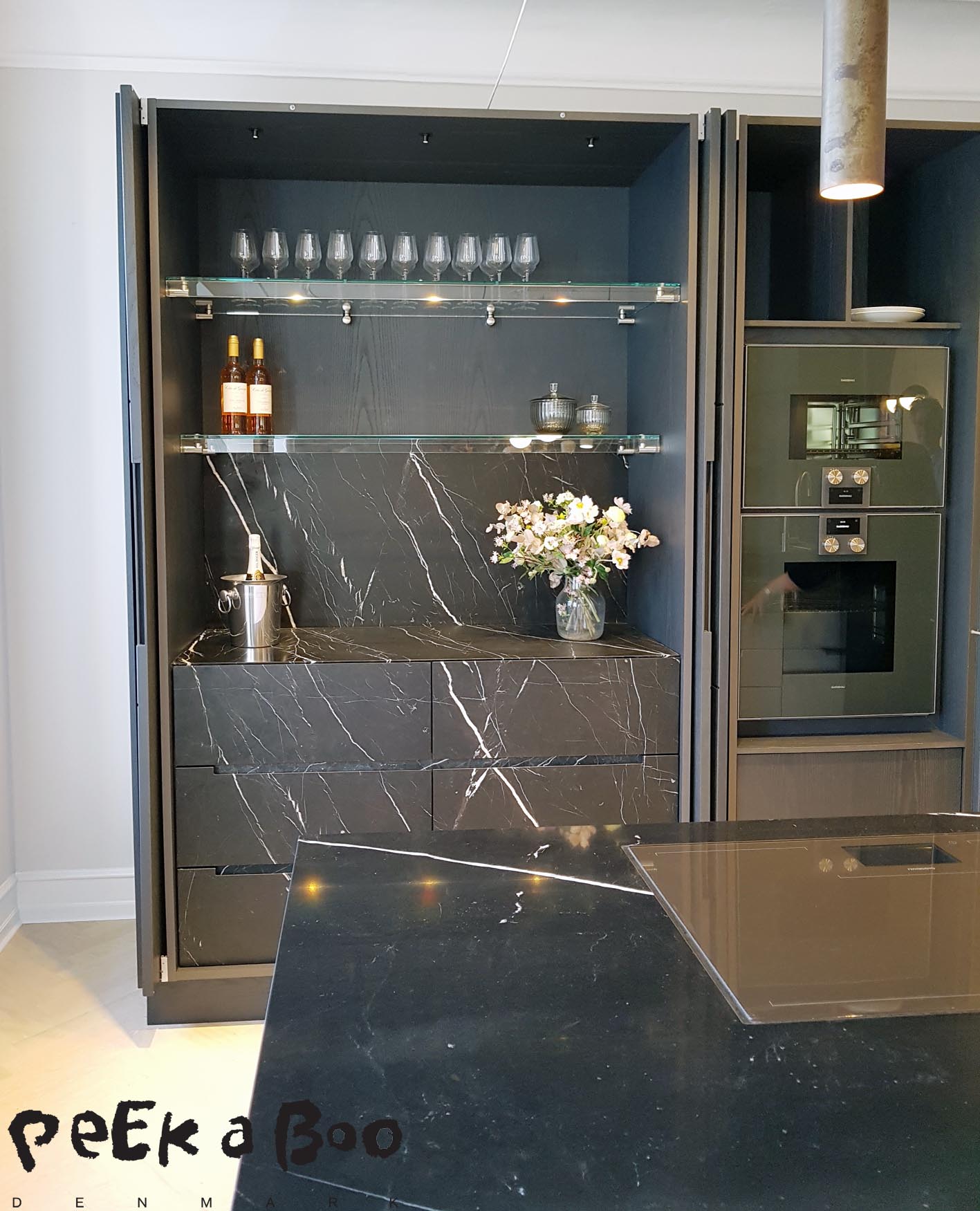 And when you open the doors....you get this...a black marble bar.